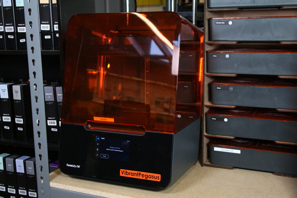 A close-up picture of a Formlabs 3 Printer named "VibrantPegasus"